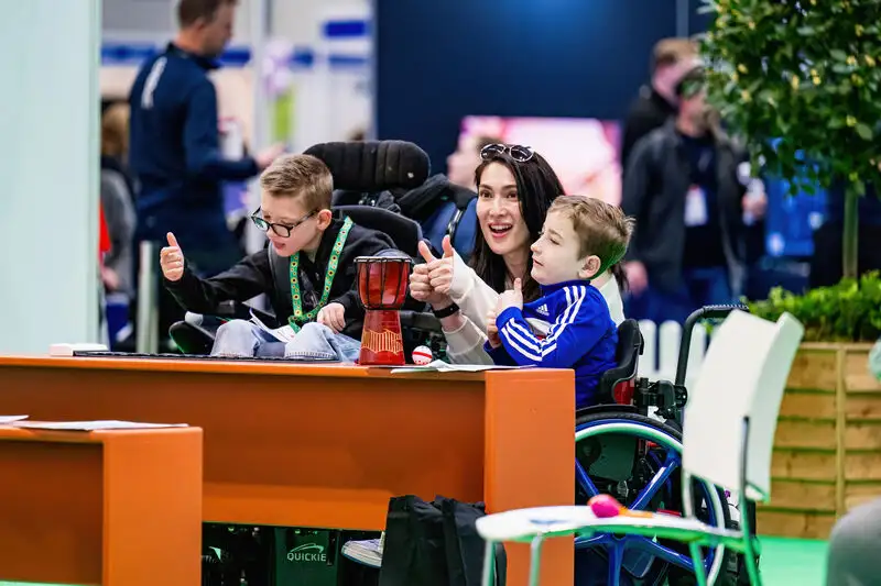 Young attendees participating in an interactive learning activity at Naidex Junior.